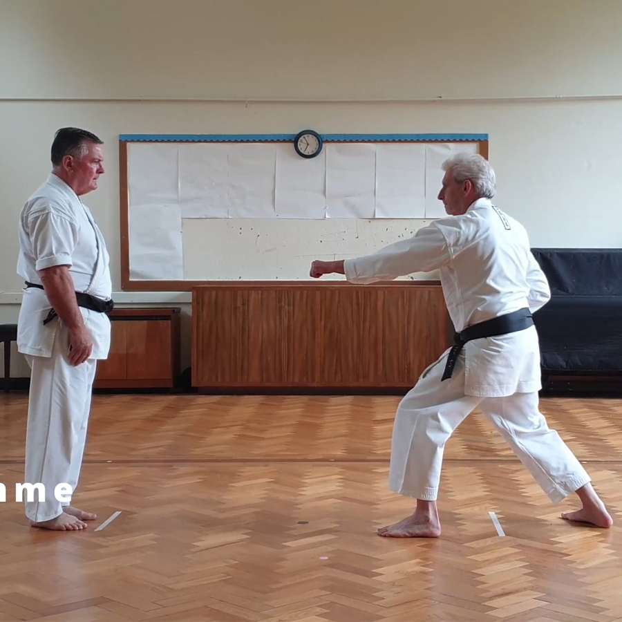 Uke attacks from Hidari Junzuki Dachi with Iyumi Ashi Chudan Junzuki